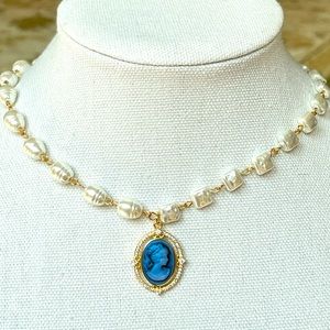 911 Glass pearls with a beautiful cz blue cameo